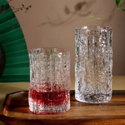Elegant Textured Clear Glass Drink Bottle